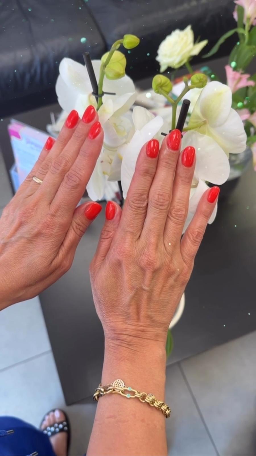 Bright red gel manicure